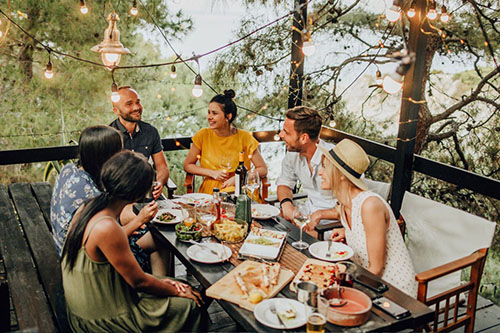 Dinner at a waterfront restaurant with invited guests