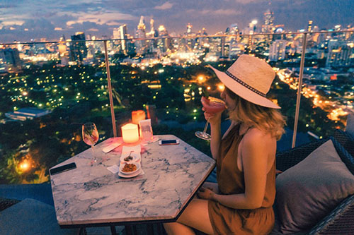 Helicopter ride over the city lights and a private rooftop romantic dinner